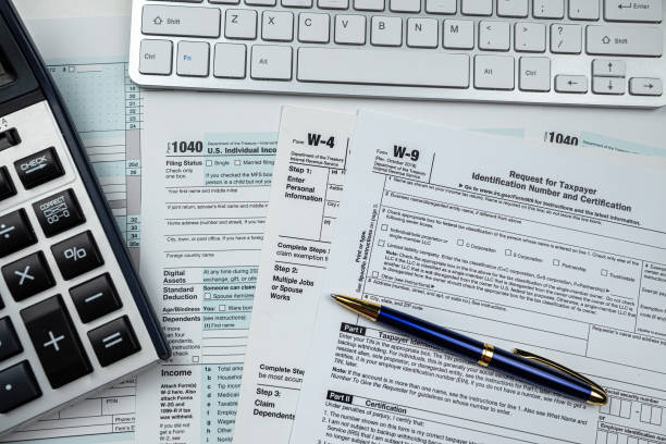 IRS tax forms including 1040, W-4, and W-9